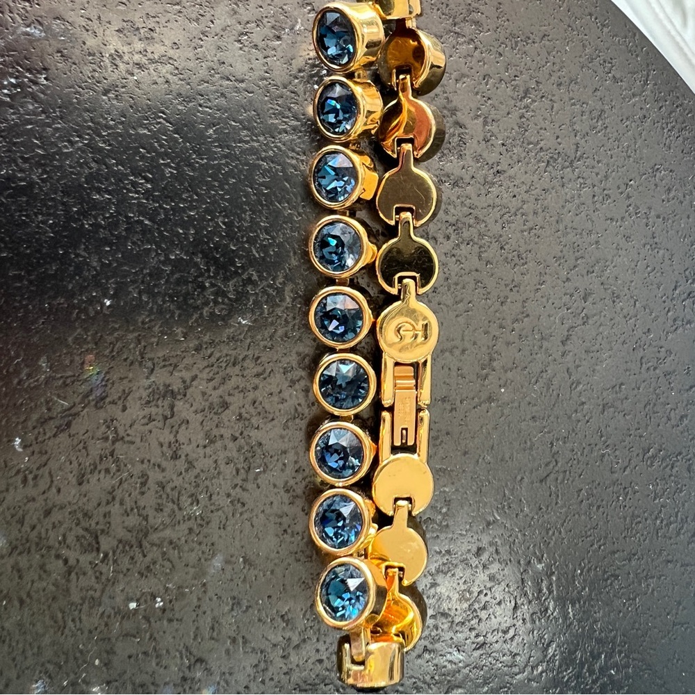 Swarovski touchstone Ice Bracelet gold tone/Montana blue stone!!!